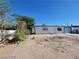 This single-story home features desert landscaping with potential and an attached one-car garage at 4808 Everman Dr, Las Vegas, NV 89122