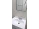 A white sink with chrome faucet and a mirror at 4808 Everman Dr, Las Vegas, NV 89122