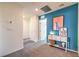 Upstairs hallway featuring a vibrant accent wall and stylish decor at 5011 Sage Mesa Ave # Lot 143, Las Vegas, NV 89139