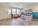 Sunlit living room showcasing stylish furnishings and decor at 5011 Sage Mesa Ave # Lot 143, Las Vegas, NV 89139