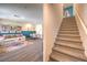 Inviting living area flows into dining and stairwell, creating an open and airy atmosphere at 5011 Sage Mesa Ave # Lot 143, Las Vegas, NV 89139
