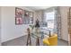 Bright office with glass desk, neutral carpeting, and unique wall art at 5011 Sage Mesa Ave # Lot 143, Las Vegas, NV 89139