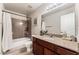 Bathroom featuring a granite countertop, updated fixtures, and a shower-tub combination at 5020 Indian River Dr # 424, Las Vegas, NV 89103