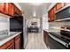 Efficient kitchen open to the dining area, equipped with stainless steel appliances and ample cabinet space at 5020 Indian River Dr # 424, Las Vegas, NV 89103