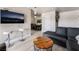 Spacious living room featuring modern furnishings and a view into the dining area at 5020 Indian River Dr # 424, Las Vegas, NV 89103