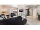 Well-lit living room with stylish furnishings and a sliding glass door leading to a balcony at 5020 Indian River Dr # 424, Las Vegas, NV 89103