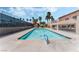 Community pool with a clear blue water at 5020 Indian River Dr # 424, Las Vegas, NV 89103