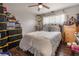 Well-lit bedroom with wood floors and comfortable furnishings at 5112 Pebble Beach Blvd, Las Vegas, NV 89108