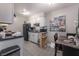 Eat-in kitchen with modern appliances, ample storage, and a dining area at 5112 Pebble Beach Blvd, Las Vegas, NV 89108