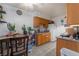 Cozy kitchen featuring wood cabinets and neutral countertops at 5112 Pebble Beach Blvd, Las Vegas, NV 89108