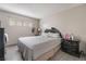 A peaceful main bedroom featuring a comfortable bed and neutral decor at 5112 Pebble Beach Blvd, Las Vegas, NV 89108
