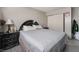 A peaceful main bedroom featuring a comfortable bed and neutral decor at 5112 Pebble Beach Blvd, Las Vegas, NV 89108