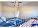 Bedroom featuring bright natural light and flexible sleeping arrangements at 5700 E Carter Ln, Pahrump, NV 89061