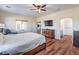Comfortable bedroom boasts nice furnishings and ensuite bathroom access at 5700 E Carter Ln, Pahrump, NV 89061