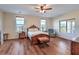 Spacious bedroom showcasing natural light and comfortable seating area at 5700 E Carter Ln, Pahrump, NV 89061