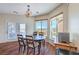 Cozy dining area with wood flooring and beautiful views to mountains at 5700 E Carter Ln, Pahrump, NV 89061