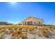 The rear of this spacious home is perfect for entertaining and features a large, covered patio at 5700 E Carter Ln, Pahrump, NV 89061