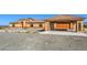 Stylish desert home featuring a gravel front yard and large garage at 5700 E Carter Ln, Pahrump, NV 89061