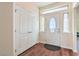 An elegant foyer welcomes you into this home with natural light from sidelight windows at 5700 E Carter Ln, Pahrump, NV 89061