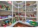 Well-organized walk-in pantry featuring ample shelving for optimal storage at 5700 E Carter Ln, Pahrump, NV 89061