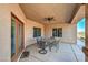 Outdoor dining is a breeze in this large covered patio, complete with ceiling fan at 5700 E Carter Ln, Pahrump, NV 89061