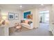 Cozy sitting room featuring comfortable seating, contemporary decor, and a soothing color palette at 6104 Aster Garden St # 129, North Las Vegas, NV 89081
