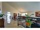 Open-concept view of the living areas and dining room with high ceilings and tiled flooring at 614 Ravenglen Dr, Las Vegas, NV 89123