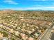 Aerial view of community including single-Gathering homes and manicured landscaping at 6335 Iginlas Goal Ave, Las Vegas, NV 89131