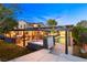 Inviting backyard featuring a pool, hot tub, pergola with string lights, and outdoor seating area at 6335 Iginlas Goal Ave, Las Vegas, NV 89131