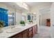 Bathroom with double sink vanity with lots of storage space at 6335 Iginlas Goal Ave, Las Vegas, NV 89131
