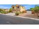 Home with RV Parking, landscaping, and a three-car garage at 6335 Iginlas Goal Ave, Las Vegas, NV 89131