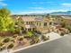 Attractive two-story home with solar panels and landscaped front yard, located in a desirable neighborhood at 6335 Iginlas Goal Ave, Las Vegas, NV 89131