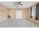 This flex room features a ceiling fan, a built-in Murphy bed, and modern flooring at 6335 Iginlas Goal Ave, Las Vegas, NV 89131
