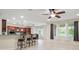 Open living area features a bar and a kitchen at 6335 Iginlas Goal Ave, Las Vegas, NV 89131