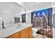 This bathroom features a modern vanity and a shower with a unique Darth Vader curtain at 637 Taliput Palm Pl, Henderson, NV 89011