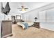 Comfortable bedroom with carpet, large windows, dresser and ample closet space, providing a retreat at 637 Taliput Palm Pl, Henderson, NV 89011