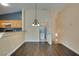 Dining area view leading to a laundry room with washer and dryer at 6576 Buster Brown Ave # 101, Las Vegas, NV 89122