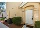 Welcoming front entrance with desert-friendly landscaping that provides curb appeal and easy maintenance at 6576 Buster Brown Ave # 101, Las Vegas, NV 89122