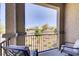 Cozy balcony with outdoor seating, offering a serene space to enjoy the neighborhood view at 664 Foam Flower Ln, Henderson, NV 89015