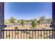 Balcony with open neighborhood view, overlooking manicured greenery at 664 Foam Flower Ln, Henderson, NV 89015