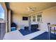 Spacious covered patio with stylish outdoor furniture, great for relaxing at 664 Foam Flower Ln, Henderson, NV 89015