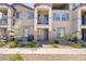 Charming townhome featuring a private balcony and well-maintained landscaping at 664 Foam Flower Ln, Henderson, NV 89015