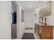 Hallway featuring neutral walls, modern decor, and a cozy rug at 664 Foam Flower Ln, Henderson, NV 89015