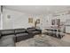 Inviting living space seamlessly connects with the kitchen and dining area at 664 Foam Flower Ln, Henderson, NV 89015