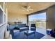 Enjoy the cozy covered patio with modern outdoor furniture and a view at 664 Foam Flower Ln, Henderson, NV 89015