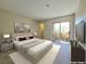 Cozy main bedroom features plush carpet, a large bed, soft lighting, and sliding doors to a balcony at 6853 Tamarus St # 202, Las Vegas, NV 89119