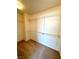 Walk-in closet with shelving and carpet flooring at 7607 Pioneer Ranch Ave, Las Vegas, NV 89113