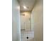 Bright hallway featuring neutral paint, tiled floors, and doors leading to other rooms at 7607 Pioneer Ranch Ave, Las Vegas, NV 89113