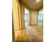 Hallway with carpet flooring leading to bedrooms with doors on either side at 7607 Pioneer Ranch Ave, Las Vegas, NV 89113