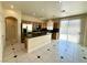 Large kitchen features stainless steel appliances, an island, and ample cabinet space at 7607 Pioneer Ranch Ave, Las Vegas, NV 89113